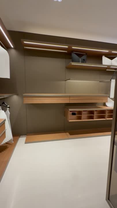 Kitchen island with gloss finish and an integrated wine rack
